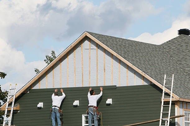 Professional Siding technician working in Tryon, NC